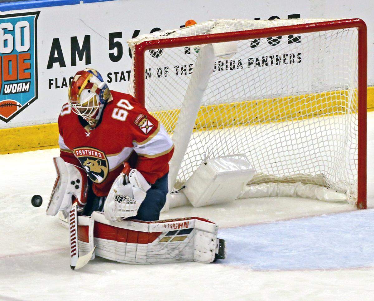 Florida Panthers goalie Chris Driedger (60) stops a puck in the third period as they play the Toronto Maple Leafs at the BB&T Center in Sunrise, Florida, Sunday, January, 12, 2020. 