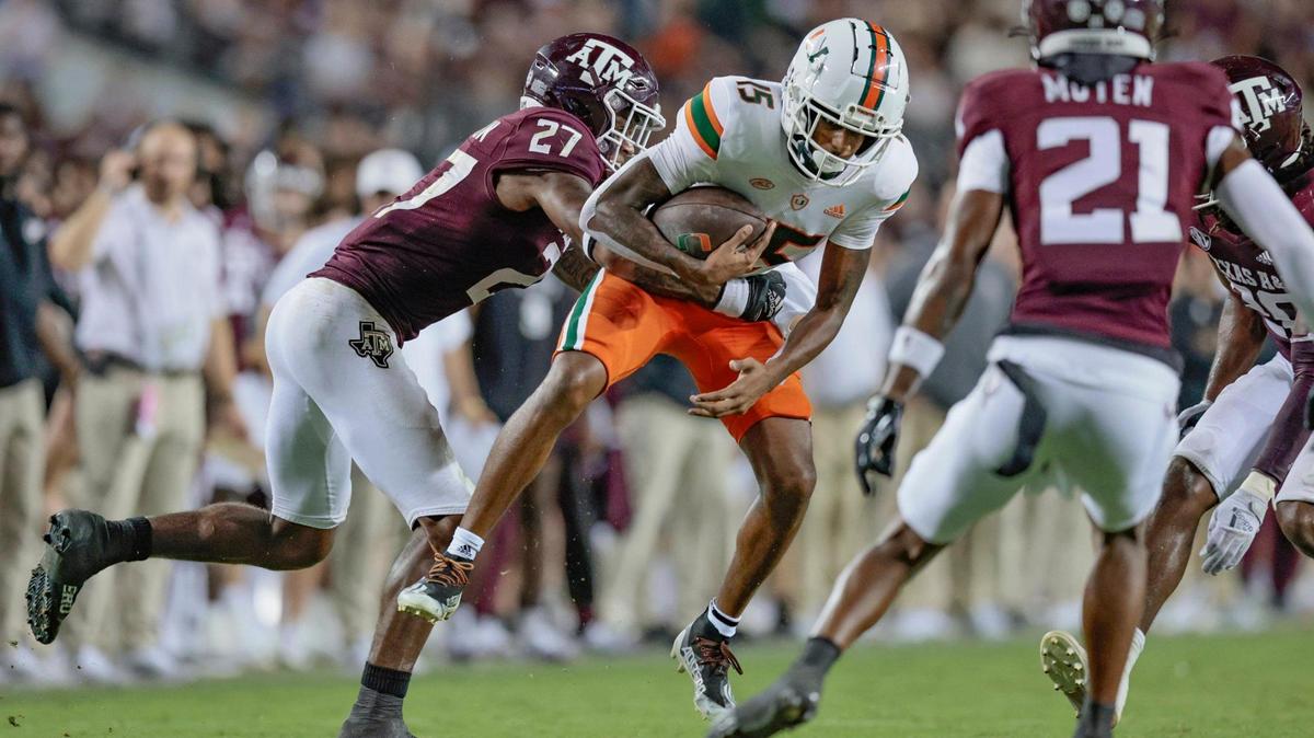 Miami Hurricanes wide receiver Jacolby George (15) on a pass reception as Texas A&M Aggies defensive back Antonio Johnson (27) defends in the second half at Kyle Field, Bryan College Station, Texas on Saturday, September 17, 2022.
