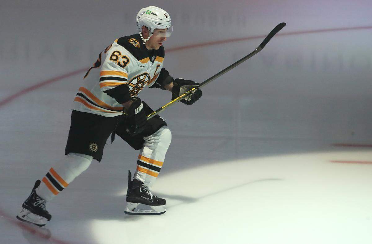 Mar 1, 2025; Pittsburgh, Pennsylvania, USA;  Boston Bruins left wing Brad Marchand (63) takes the ice to warm up against the Pittsburgh Penguins at PPG Paints Arena.