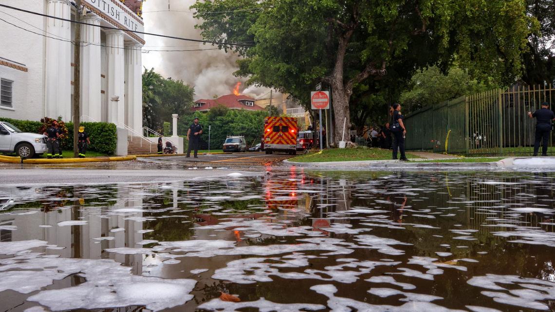 Who was the person found shot at a burning Miami apartment building?