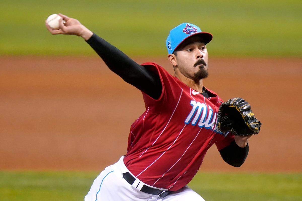 Miami Marlins starting pitcher Pablo Lopez throws during the third inning of a baseball game against the Atlanta Braves, Sunday, July 11, 2021, in Miami.