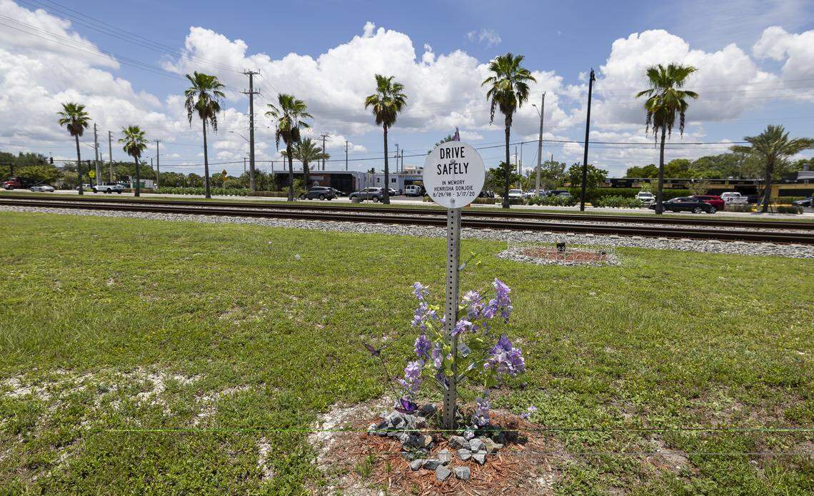 The Brightline corridor is dotted with memorials for people who were killed by trains. This memorial, for 21-year-old Henrisha Victoria France Donjoie, stands near a railroad crossing off North Dixie Highway and Northeast 3rd Street in Pompano Beach. Police said Donjoie drove around the lowered railroad crossing arms and into the train’s path.