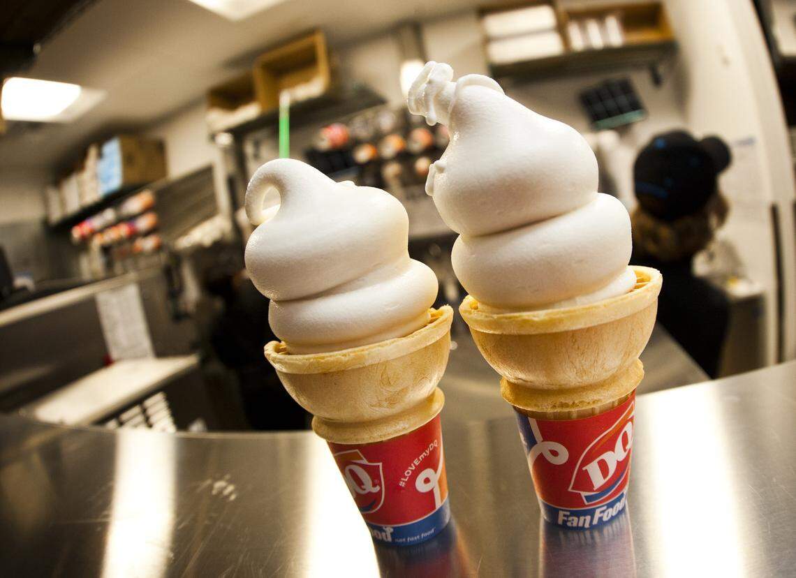 A couple of cones sit on the counter at Dairy Queen.