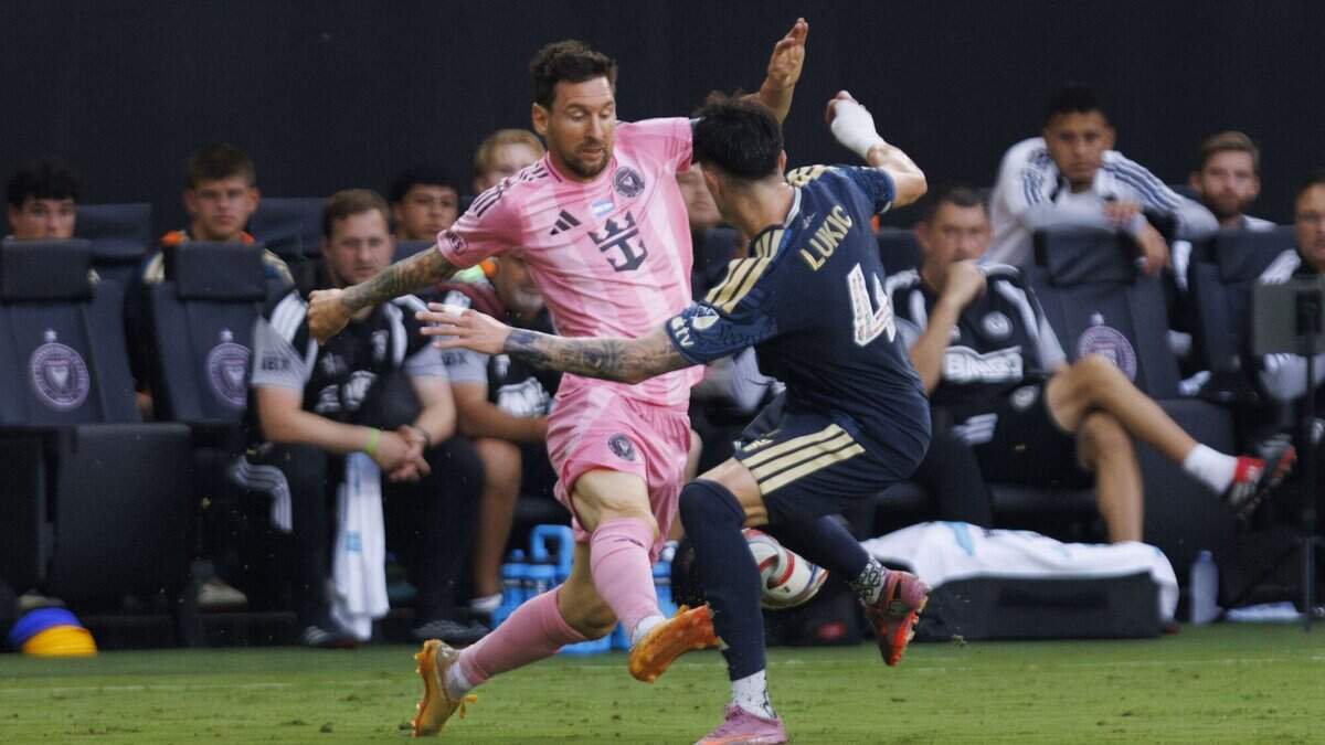 Inter Miami CF midfielder Leo Messi (10) kicks the ball around Philadelphia Union midfielder Jovan Lukic (4) during the first half of a game on Sunday, May 24, 2026, at Nu Stadium at Miami Freedom Park in Miami, Fla.