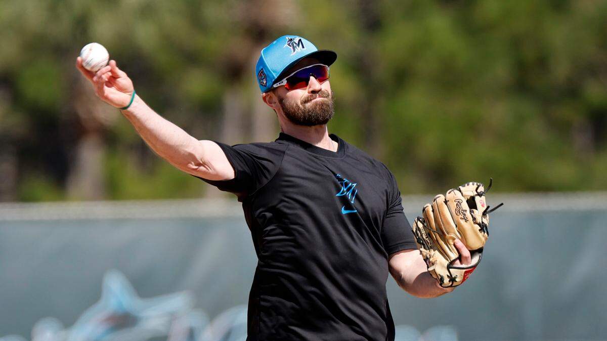 Miami Marlins infielder Jon Berti throws to first base during spring training at Roger Dean Chevrolet Stadium in Jupiter, Florida on Tuesday, February 20, 2024.