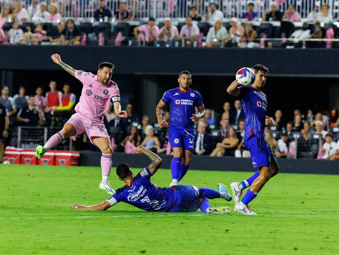 Inter Miami forward Lionel Messi (10) attempts a shot on the goal against the defense of Cruz Azul defender Carlos Salcedo (3) during the second half of a Leagues Cup group stage match at DRV PNK Stadium on Friday, July 21, 2023, in Fort Lauderdale, Fla.