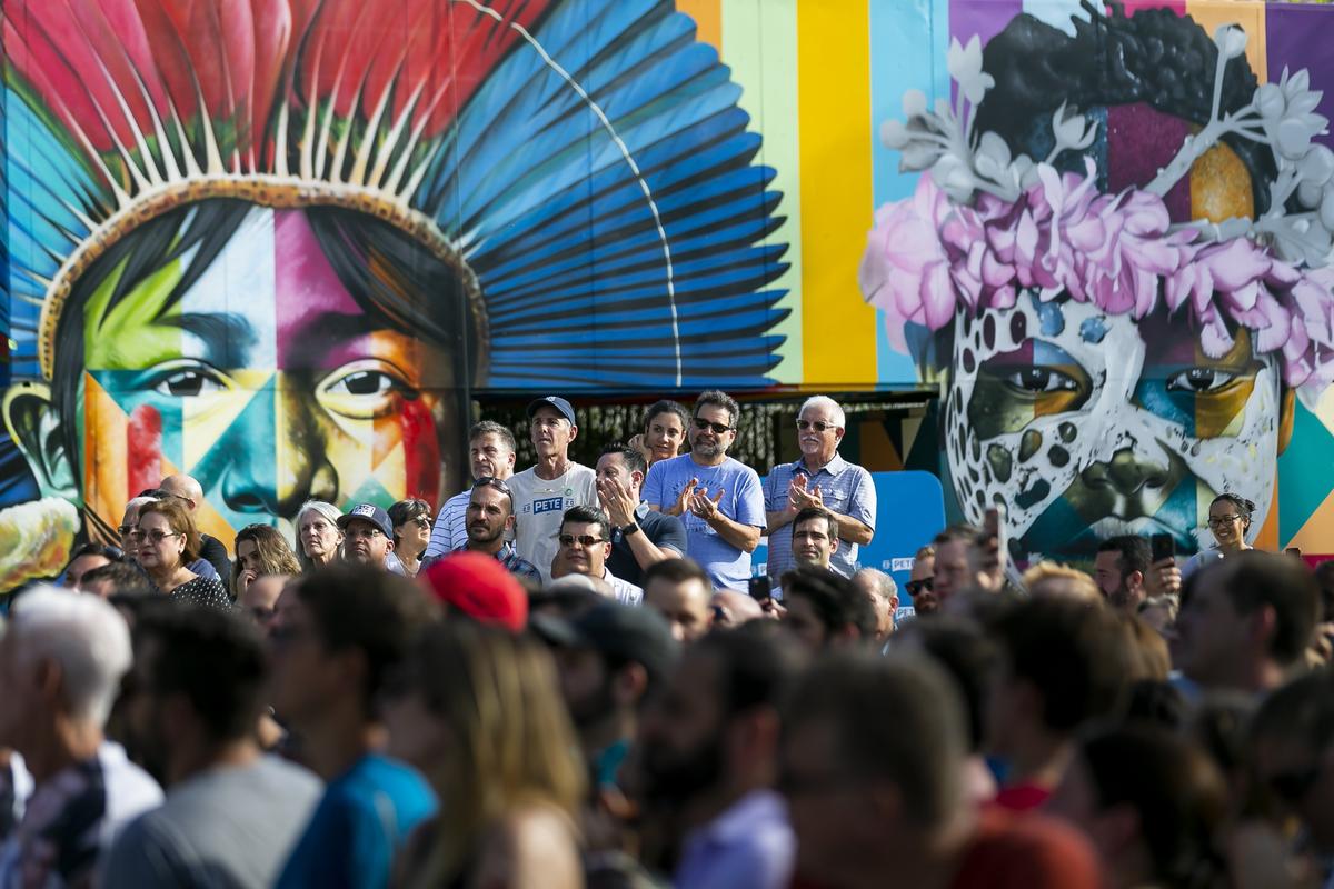 Attendees listen to Pete Buttigieg, mayor of South Bend, Indiana, and 2020 presidential candidate, as he speaks during a grassroots fundraiser at Wynwood Walls on Monday, May 20, 2019.