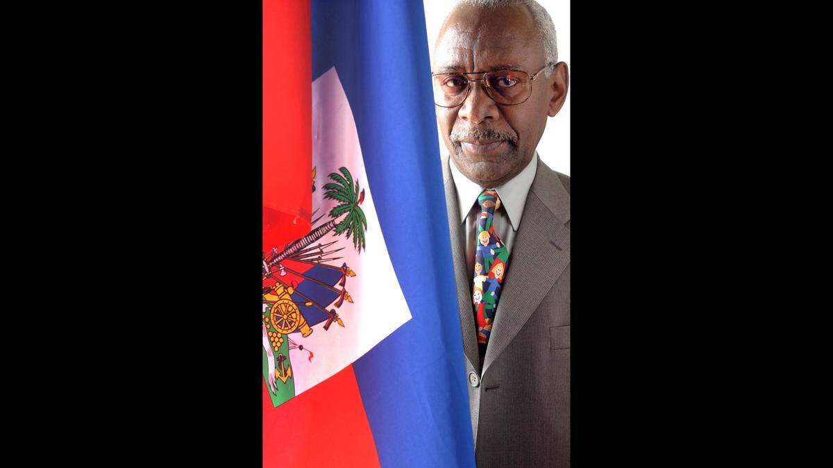 Jean-Claude Exulien, project director for the Center for Information and Orientation in Miami in a 2003 photo. In the 1970s, he was jailed under Haiti dictator Jean-Claude Duvalier for his lectures that criticized the regime. In 1977, Exulien escaped to Miami and made a career as an advocate for a free Haiti and supported programs in his adopted Miami.