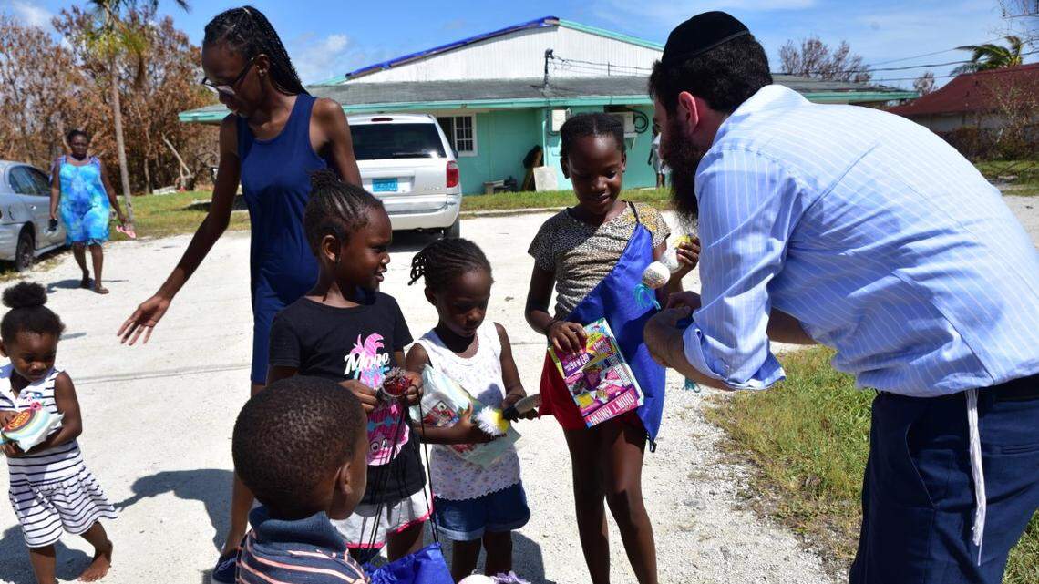 Rabbi Sholom Bluming, of Chabad of the Bahamas, delivers toys to children in Freeport in the days after Hurricane Dorian hit the island nation on Sept. 1.