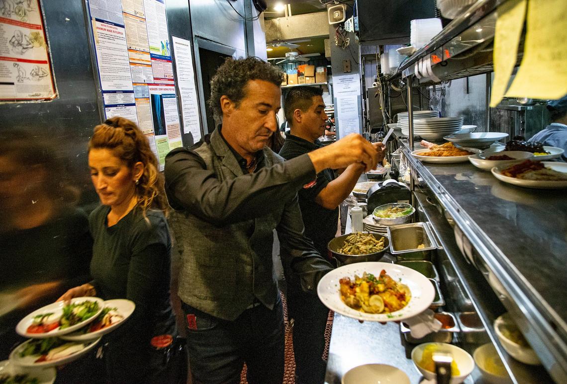 Owner Gerardo Cea works in kitchen at Cafe Prima Pasta, an Italian restaurant that’s been on Miami Beach for 27 years.