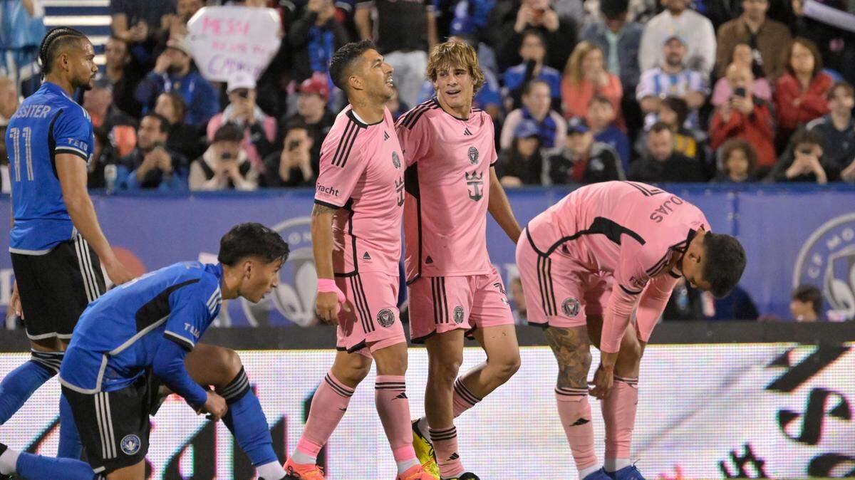 May 11, 2024; Montreal, Quebec, CAN; Inter Miami CF midfielder Benjamin Cremaschi (30) celebrates with forward Luis Suarez (9) after scoring a goal against CF Montreal in the second half at Stade Saputo. Mandatory Credit: Eric Bolte-USA TODAY Sports