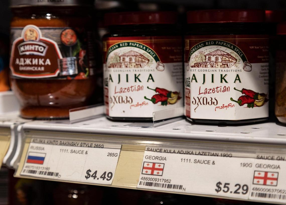 Sauces from the Republic of Georgia and Russia line the shelves at the grocery store and deli Matryoshka in Sunny Isles Beach, which has a large population of Eastern European immigrants. Matryoshka, a favorite eatery for many residents, sells products from across Eastern European countries.