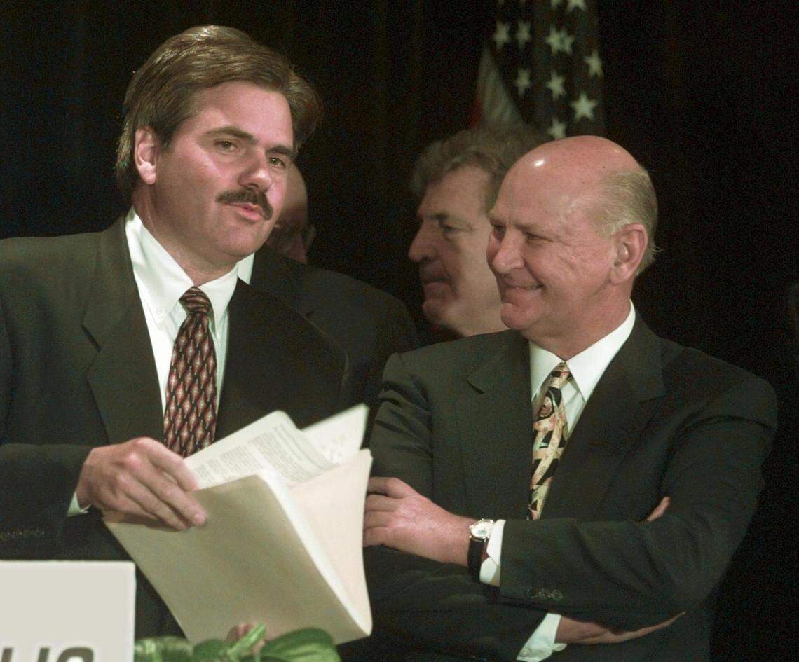 Steven Berrard, left, and Wayne Huizenga, co-chief executive officers of Republic Industries, at a news conference in New York, Aug. 21, 1997. At the time of this file photo Republic was reportedly the largest automotive retailer in the United States, with 108 dealerships and it represented 20 car makers.