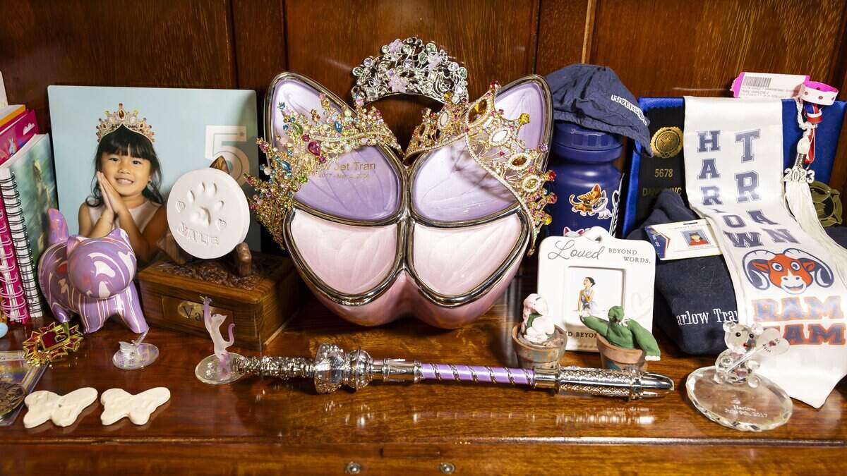 A butterfly-themed urn containing the ashes of Harlow Jet Tran is displayed at the home of her parents, Danny Tran and Samari Curbelo, on Wednesday, June 3, 2026, in Coral Springs, Fla. Harlow was killed in a car accident, after a man fleeing a Coral Springs officer on May 5, 2024, struck the SUV driven by her great-grandmother. The family has filed a wrongful-death lawsuit against the city.