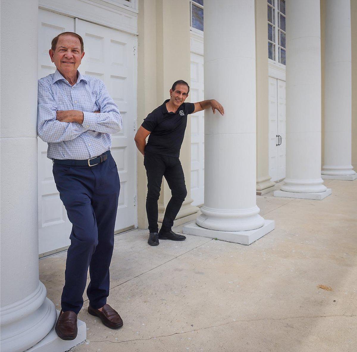 Lewis S. “Mike” Eidson, president of the nonprofit, Sanctuary of the Arts, left, and Rafi Maldonado López, director, are photographed at the front doors of the First Church of Christ Scientist. The church was repurposed into a concert hall by the nonprofit.
