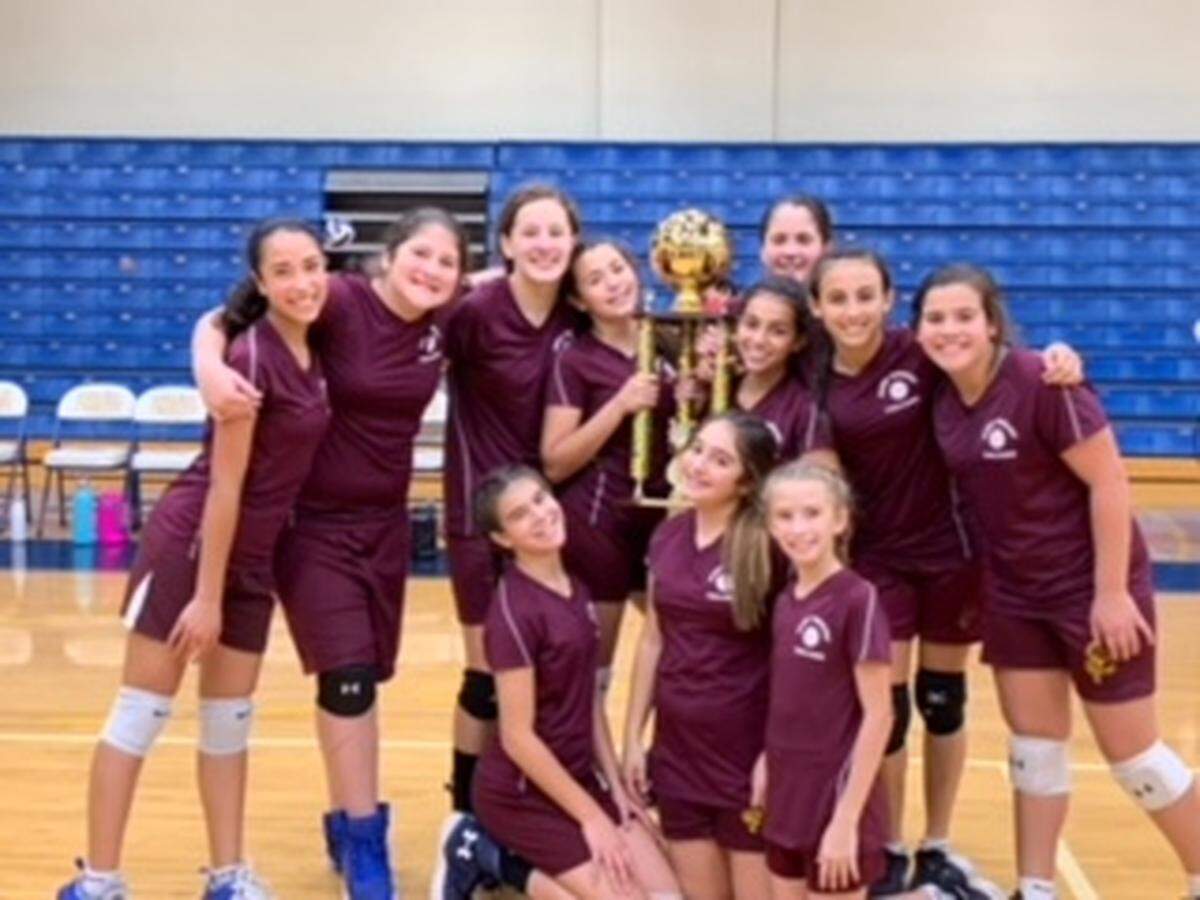 St. Timothy Parish School’s volleyball team recently won the Catholic League Volleyball Champions Trophy during a competition held at Belen Jesuit Preparatory School in Miami. From left: team members Sophia Fernandez, Gaby Noriega, Carmen Rionda, Carolina Cueto, Nina Diaz, Danielle Noriega, Olivia Fraga, Olivia Magarino, Paulina Varona, Carolina Moussa and Carolina Timiraos.