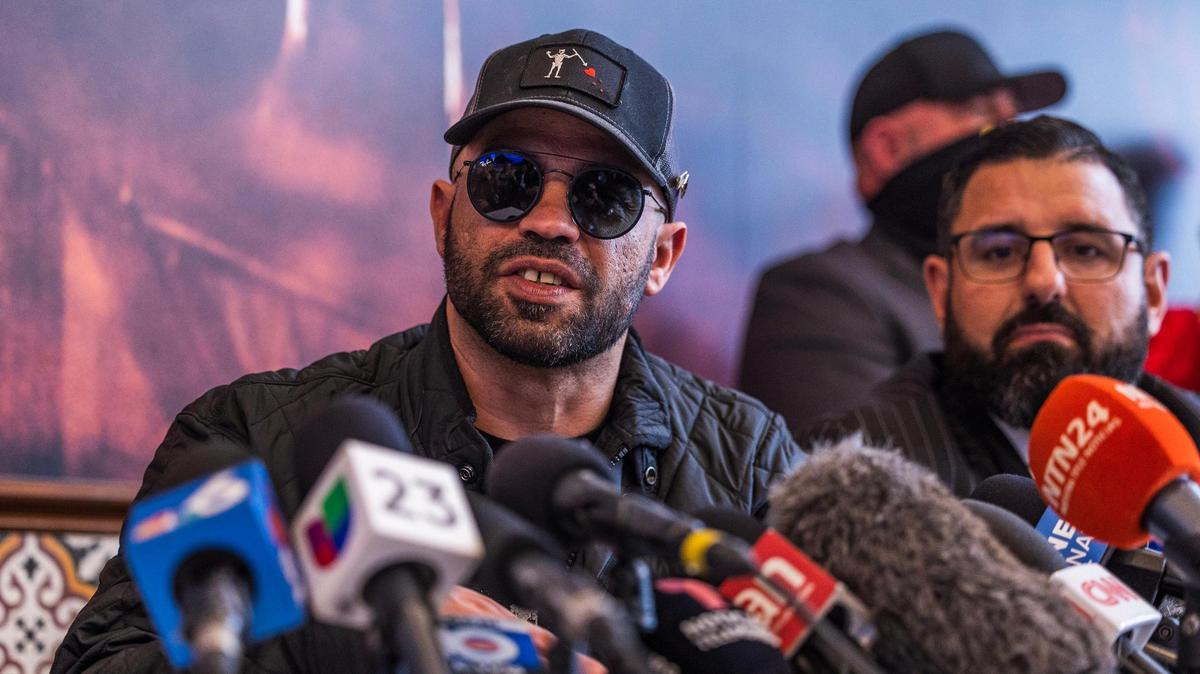 Former Proud Boy leader Enrique Tarrio talks during his first press conference flanked by his lawyer Nayib Hassan (far right) after being released from a federal prison by President Donald Trump under a executive order last Monday, at Las Vegas Cuban Cuisine Restaurant in Doral, on Friday, January 24, 2025.