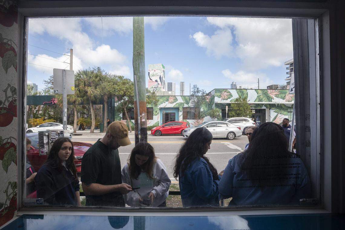 Fans line up outside a pop-up shop celebrating the release of Harry's House and the upcoming tour by singer Harry Styles in the Wynwood neighborhood of Miami on Friday, March 6, 2026. The temporary shop features exclusive merchandise, album displays and themed installations tied to the artist's latest release and tour.