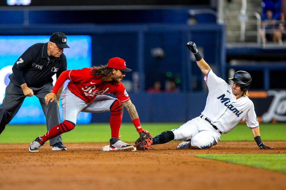 Miami Marlins base runner Luke Williams (46) slides safely into second base for a double during the third inning of an MLB game against the Cincinnati Reds at loanDepot park in the Little Havana neighborhood of Miami, Florida, on Wednesday, August 3, 2022.