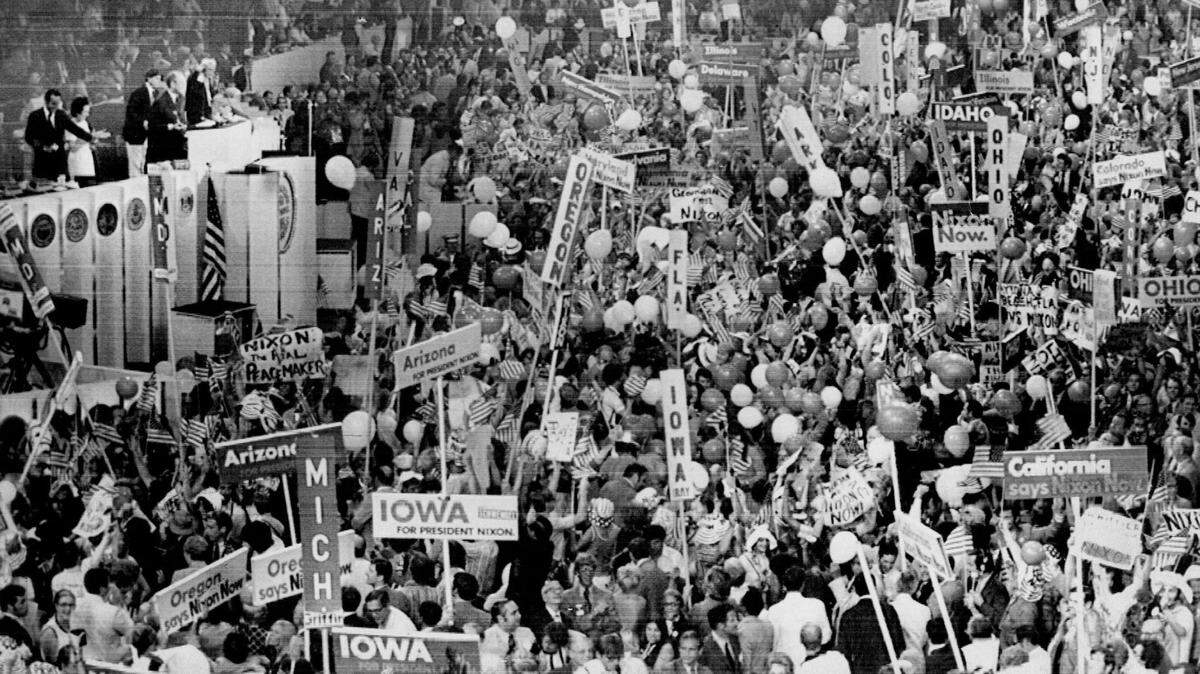 Delegates to the Republican National Convention make noise as President Nixon is announced as their candidate for reelection in 1972.