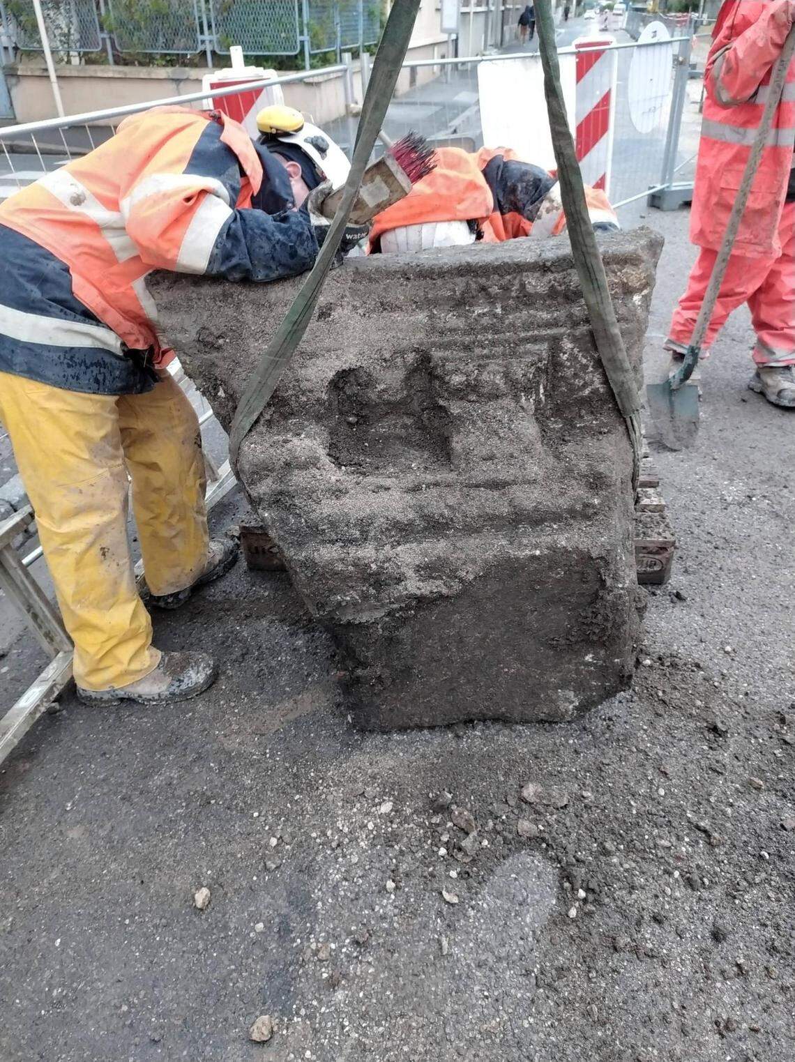 Roman walls were previously discovered, then one piece of the stonework was found to have carvings.