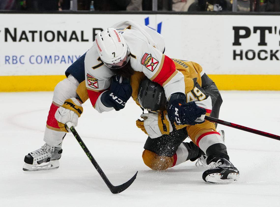 Jun 3, 2023; Las Vegas, Nevada, USA; Florida Panthers defenseman Radko Gudas (7) grapples with Vegas Golden Knights center Ivan Barbashev (49) in the second period in game one of the 2023 Stanley Cup Final at T-Mobile Arena. Mandatory Credit: Stephen R. Sylvanie-USA TODAY Sports