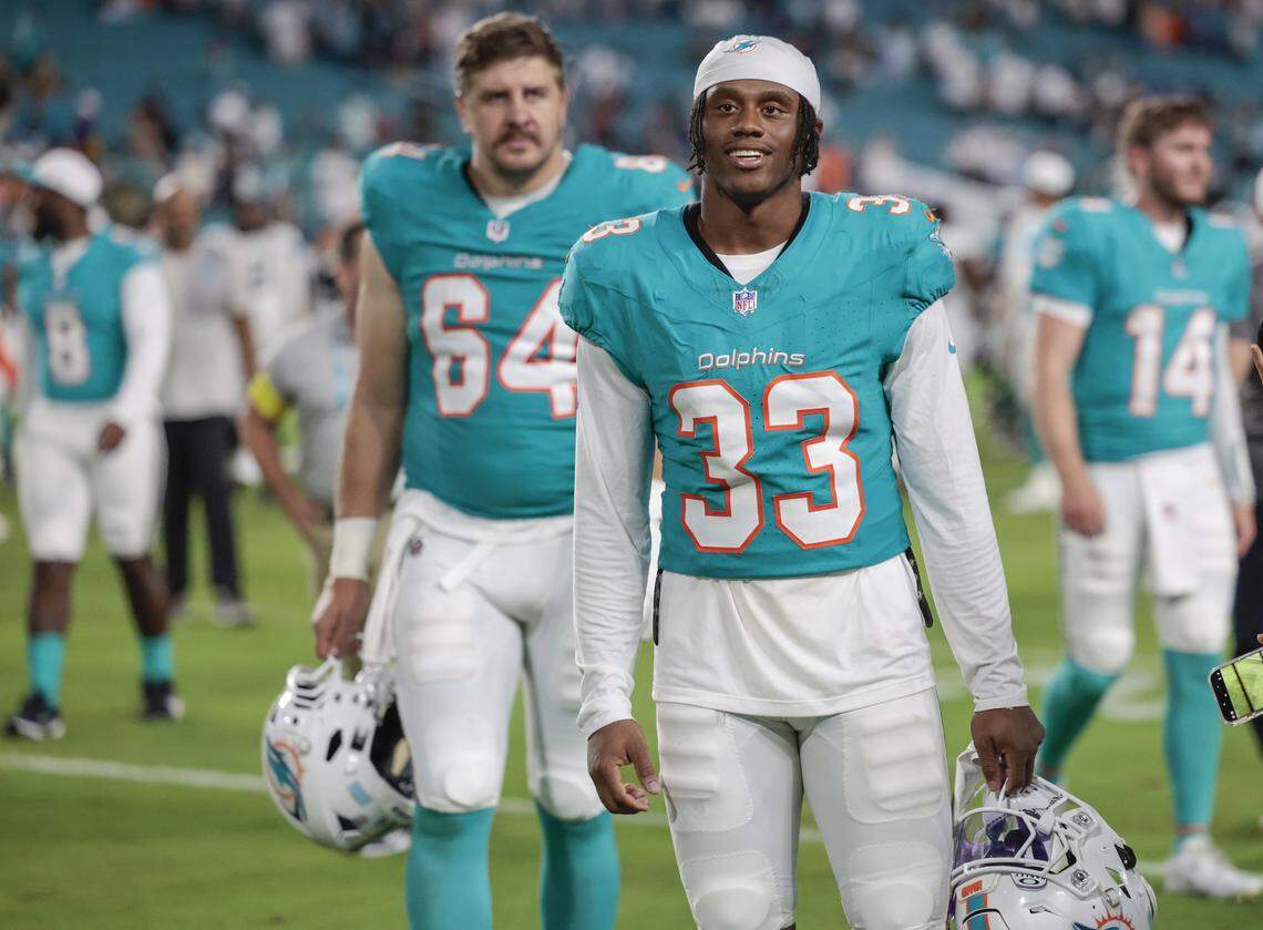 Miami Dolphins cornerback Jason Marshall Jr. (33) walks off the field after the Dolphins defeat Jacksonville Jaguars during an NFL football game at Hard Rock Stadium in Miami Gardens, Florida, on Saturday, August 23, 2025.