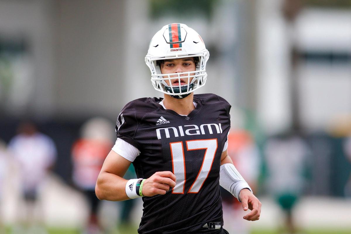 Miami Hurricanes quarterback Emory Williams (17) runs on the field during spring practice at the University of Miami in Coral Gables, Florida, Saturday, March 4, 2023.