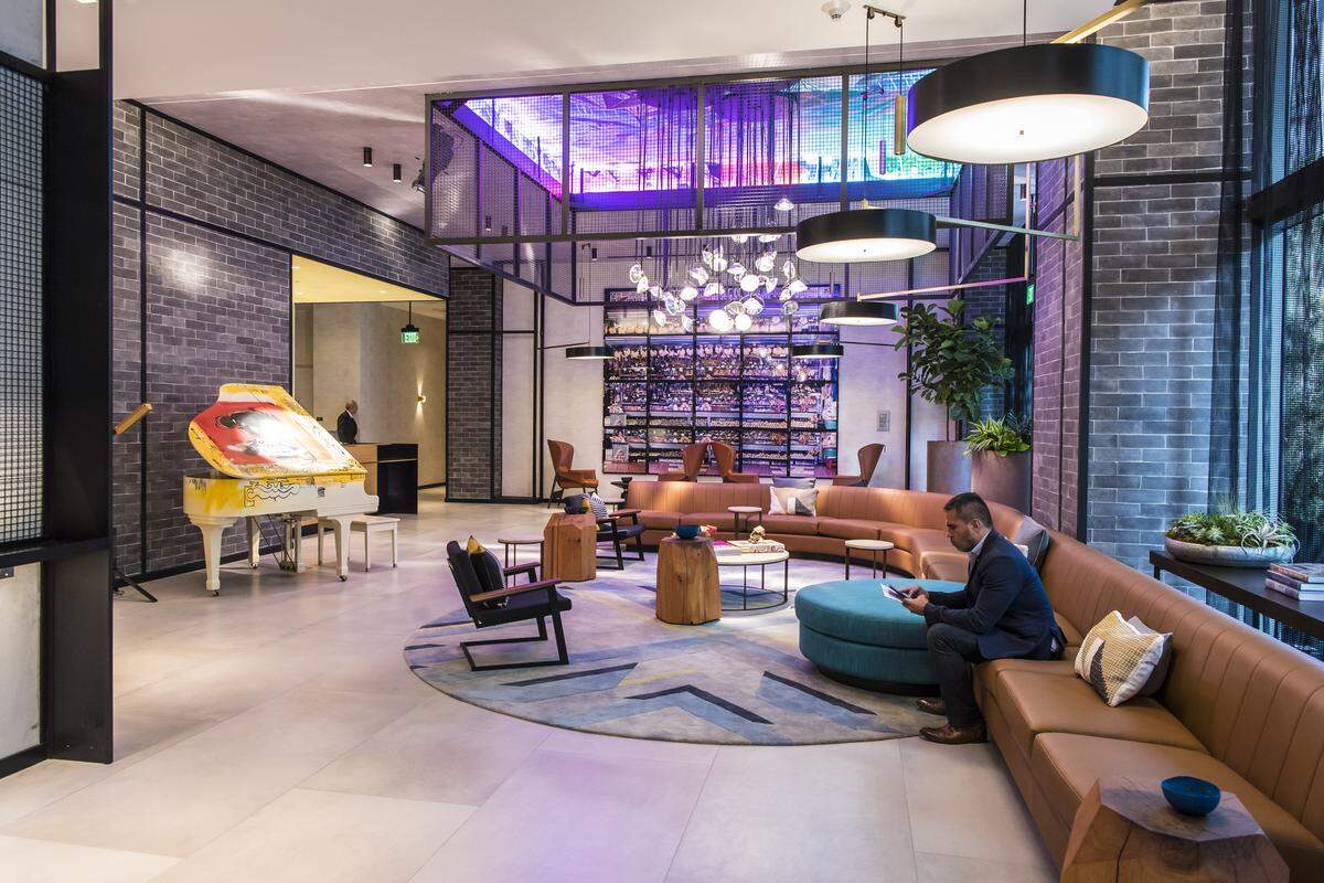 The lobby at Hyde Midtown serves both condominium residents and hotel guests.