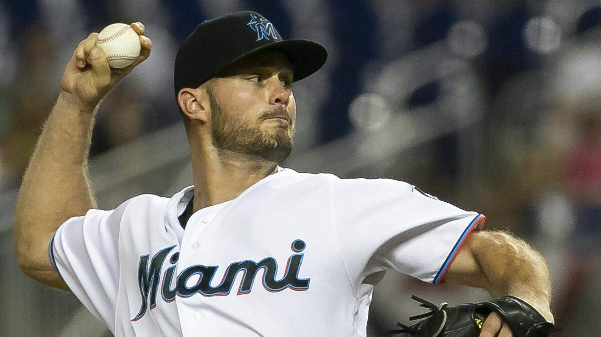 Miami Marlins pitcher Tyler Kinley (39) pitches agains the New York Mets in the seventh inning of a baseball game at Marlins Park in Miami on Monday, April 1, 2019.