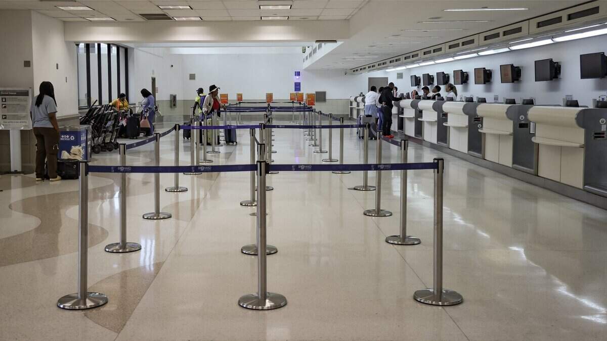 The lines at Sunrise Airlines terminal are nonexistent; few travelers check in for the 3 p.m. flight to Cap-Haitian at Fort Lauderdale-Hollywood International Airport on Thursday, August 6, 2026.  As TPS status expired, many members of the South Florida Haitian community have chosen to keep a low profile. This has led to a reduced presence in the local immigrant economy and in public activities, particularly in Miami-Dade and Broward counties.