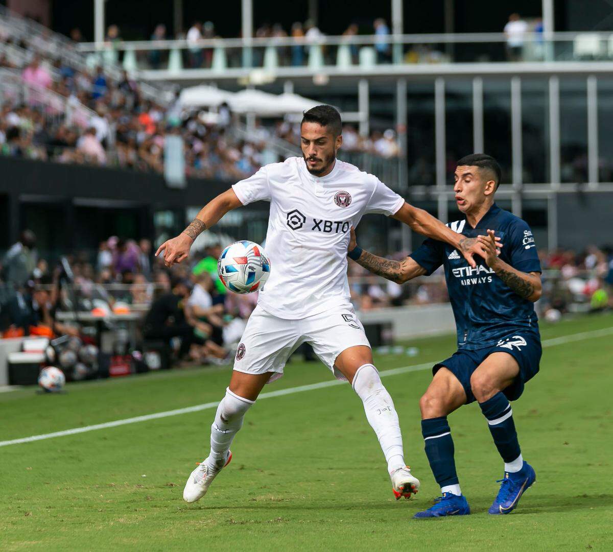 Inter Miami defender Nicolas Figal (5) looks to gain possession of the ball against New York City FC midfielder Santiago Rodriguez (42) during the first half of their MLS soccer match at DRV PNK Stadium on Saturday, October 30, 2021, in Fort Lauderdale, Florida.