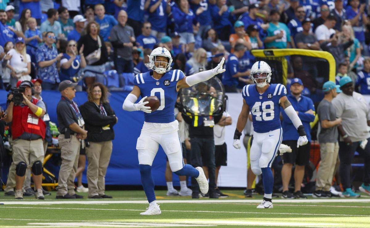 Indianapolis Colts safety Cam Bynum (0) celebrates after intercepting Miami Dolphins quarterback Tua Tagovailoa (1) during the first half of an NFL game at Lucas Oil Stadium on Sunday, Sept. 7, 2025, Indianapolis, Indiana.
