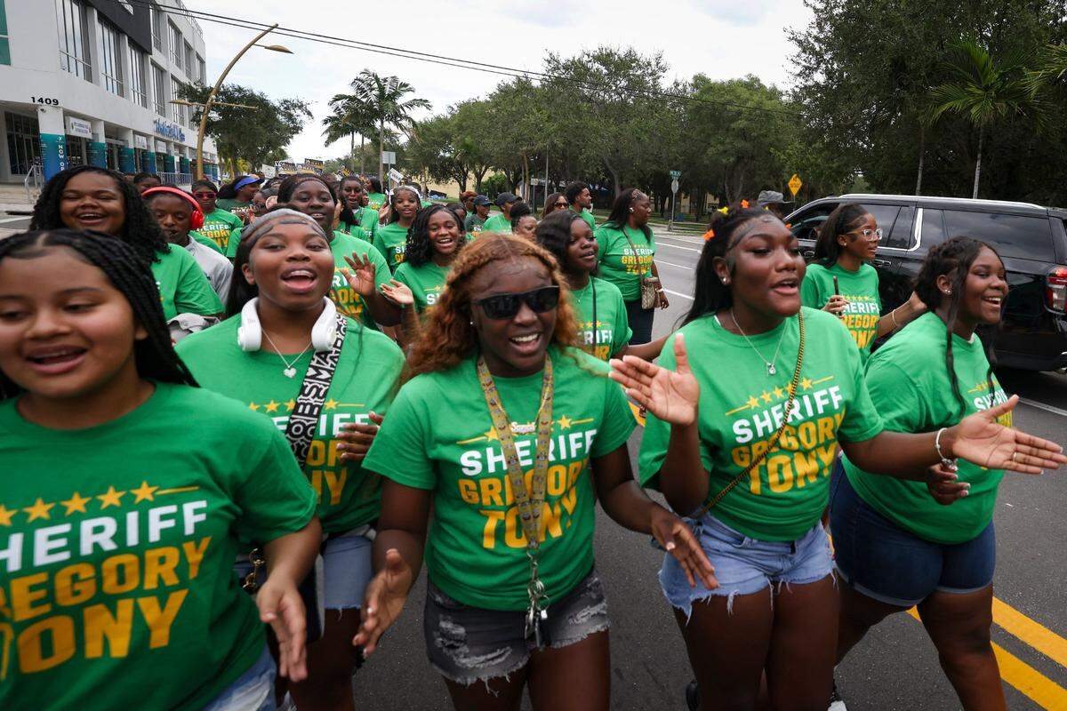 Teens march in support of Sheriff Gregory Tony during the Souls to the Polls march to the African American Research Library and Cultural Center on Sunday, Aug. 18, 2024, in Fort Lauderdale, Fla.