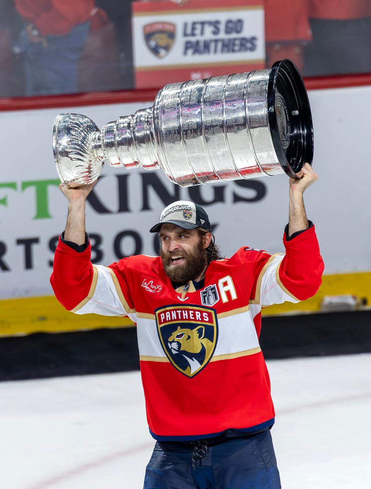 Florida Panthers defenseman Aaron Ekblad (5) lifts the Stanley Cup after defeating the Edmonton Oilers 5-1 in Game 6 of the Final at Amerant Bank Arena in Sunrise, Fla., on Tuesday, June 17, 2025, clinching the NHL championship.