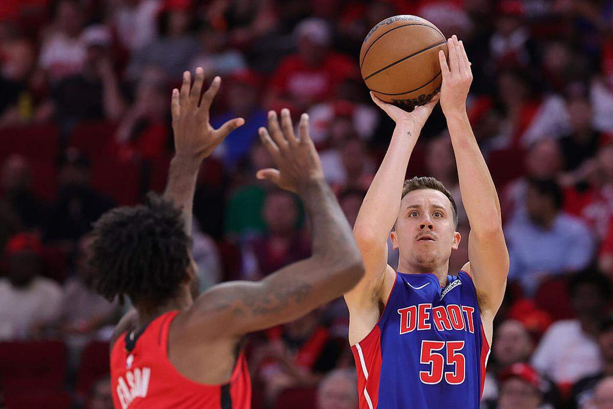 Duncan Robinson #55 of the Detroit Pistons shoots the ball against Tari Eason #17 of the Houston Rockets during the first half at Toyota Center on October 24, 2025 in Houston.