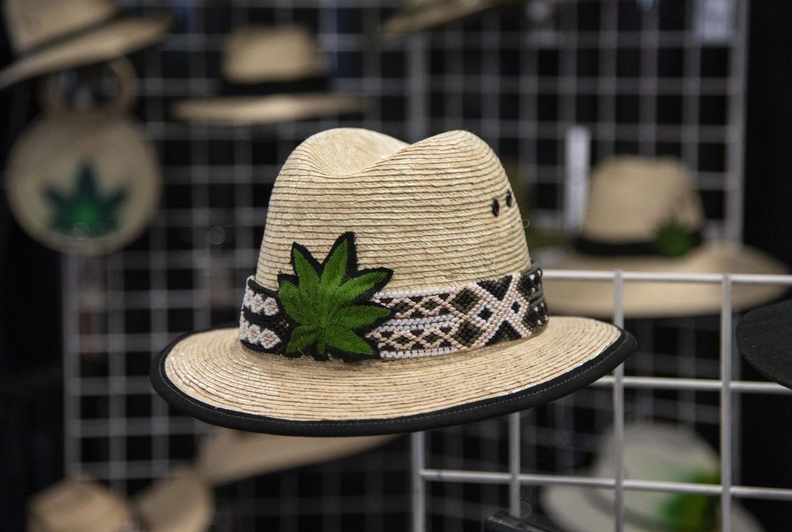 At the Hats by Oli booth, attendees could purchase straw hats, bags and other accessories adorned with hemp leaves during the USA CBD Expo at the Miami Beach Convention Center on August 2, 2019.