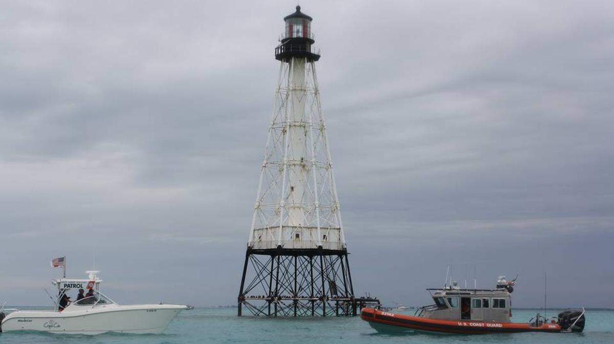 Alligator Light off Islamorada is one of the most iconic images associated with the Florida Keys. Here it is flanked by Coast Guard Auxiliary and U.S. Coast Guard boats.