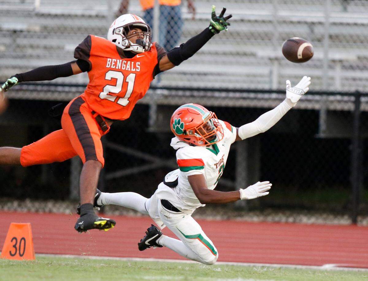 Piper Bengals defensive back Jahmani Chin-Suer (21) attempts to intercept a pass intended for Blanche Ely Tigers Michael Warren during football game on Friday, September 20, 2024 at Piper HS in Sunrise. Andrew Uloza / for Miami Herald