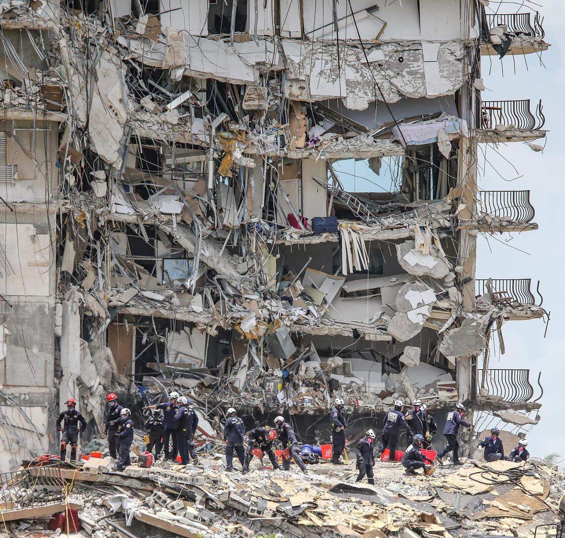 South Florida Urban Search and Rescue team look for survivors at the 12-story oceanfront condo, Champlain Towers South, on Saturday, June 26, 2021. The building partially collapsed early Thursday morning in the town of Surfside.