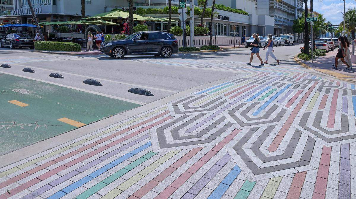 Rainbow-colored crosswalks are painted at the intersection of 12 Street and Ocean Drive in Miami Beach, Florida on Thursday, August 20, 2025. These decorated crosswalks have been become controversial throughout S. Florida.