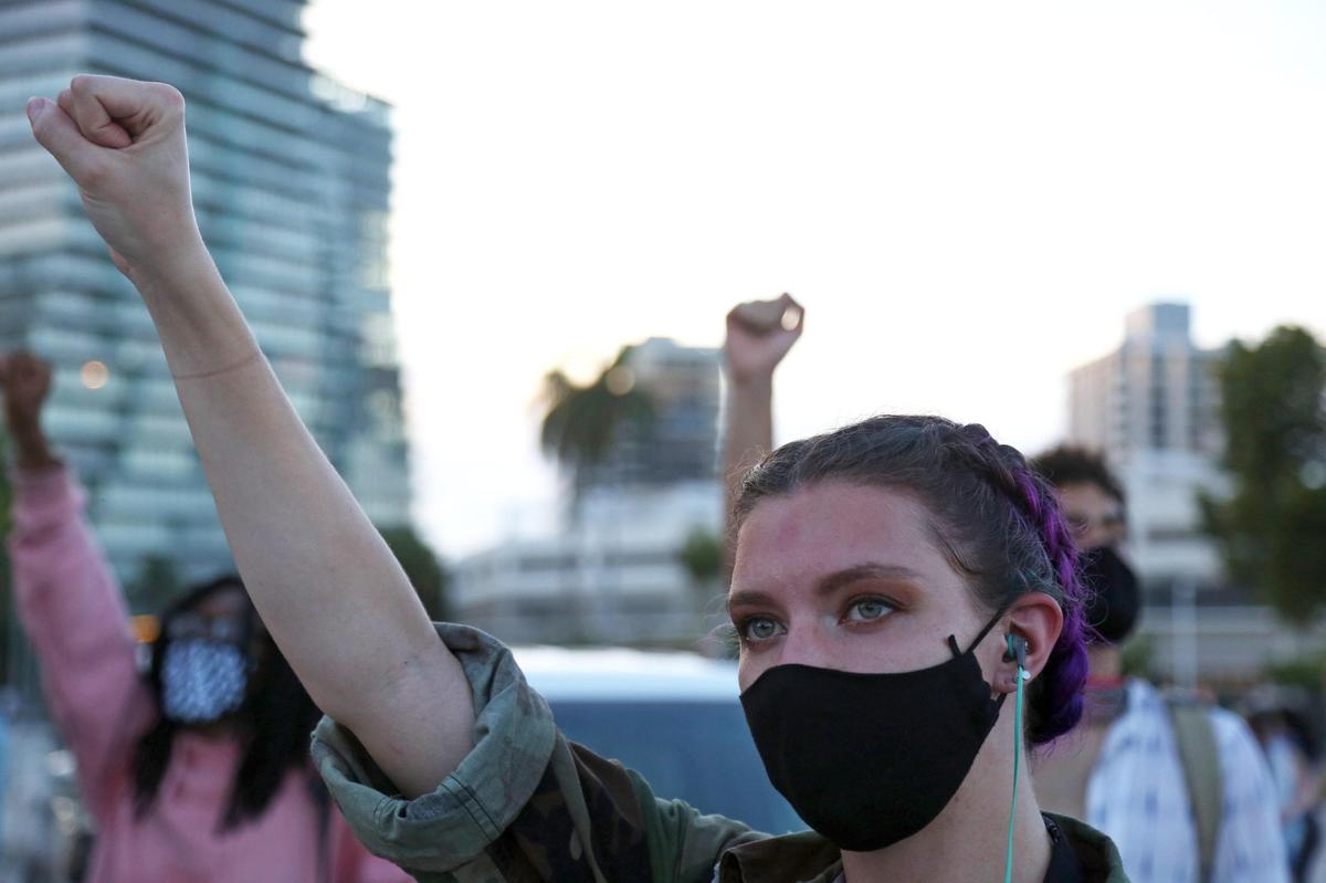 Kristine Padgett attends a Justice for Miami rally outside Miami City Hall demanding that Miami-Dade State Attorney Katherine Fernández Rundle drops all charges against Black Lives Matter demonstrators, including more than 100 demonstrators who have been arrested in the 70 days since George Floyd’s death, Tuesday, August 11, 2020.