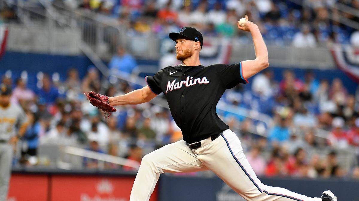Mar 29, 2024; Miami, Florida, USA; Miami Marlins starting pitcher A.J. Puk (35) winds up to throw a pitch during the first inning against the Pittsburgh Pirates at loanDepot Park. Mandatory Credit: Michael Laughlin-USA TODAY Sports