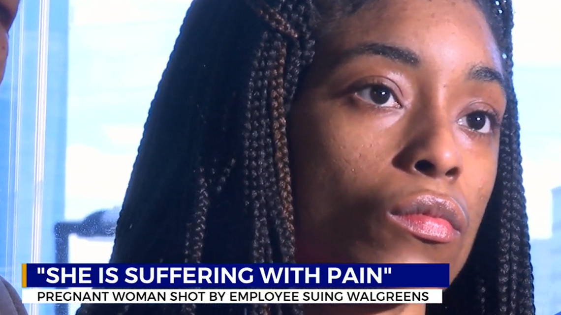 A Walgreens worker shot a pregnant woman in a store parking lot and her baby was born prematurely, a lawsuit says.