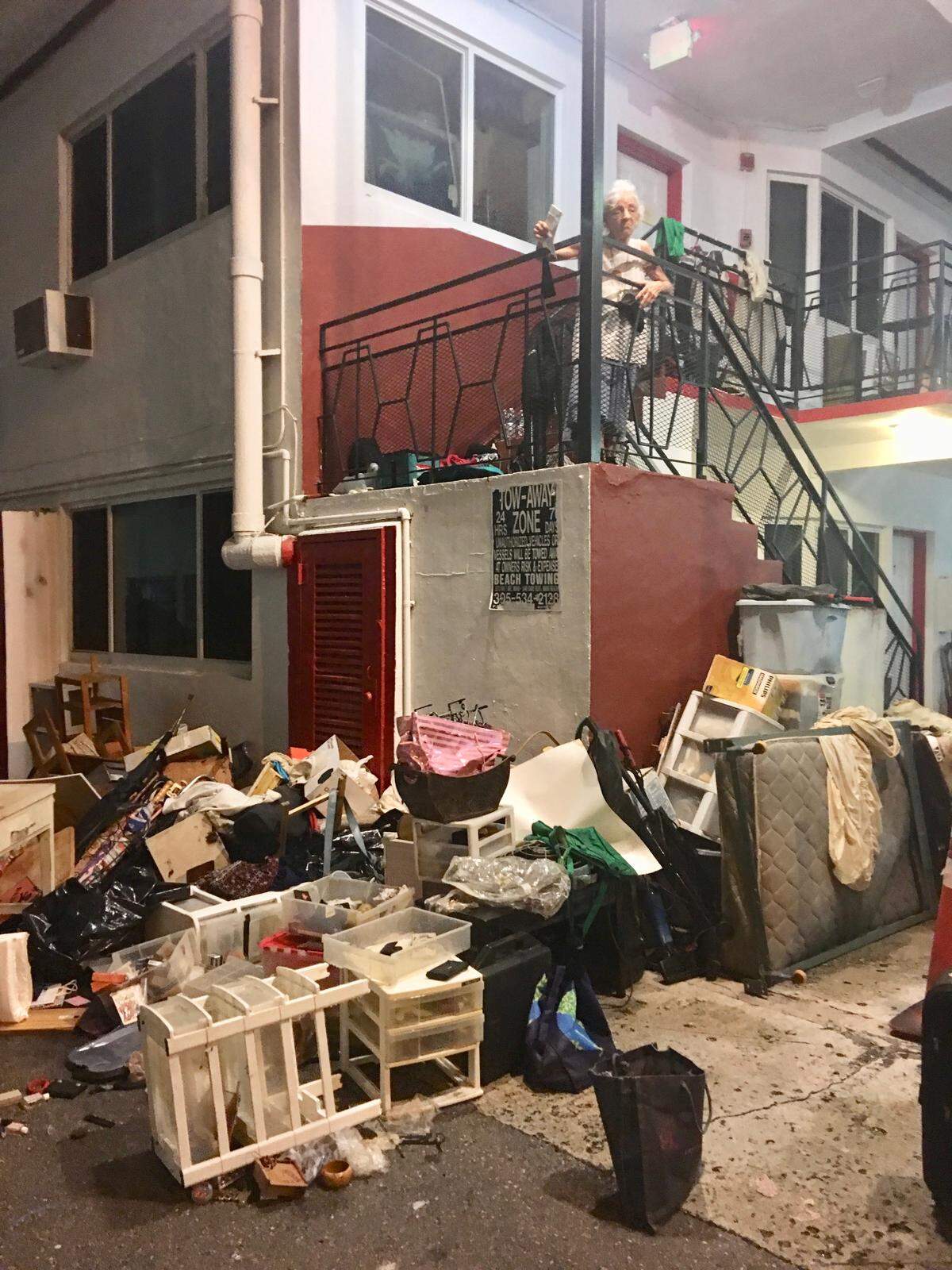 Maria Cazanes outside the apartment where she lived with her family in Miami Beach. She was evicted Friday, Aug. 30, 2019, hours after Miami-Dade County issued a declaration of emergency ahead of Hurricane Dorian. Mayor Carlos Gimenez said that was a mistake, and that county officers won’t help process eviction papers in the future during storm emergencies.