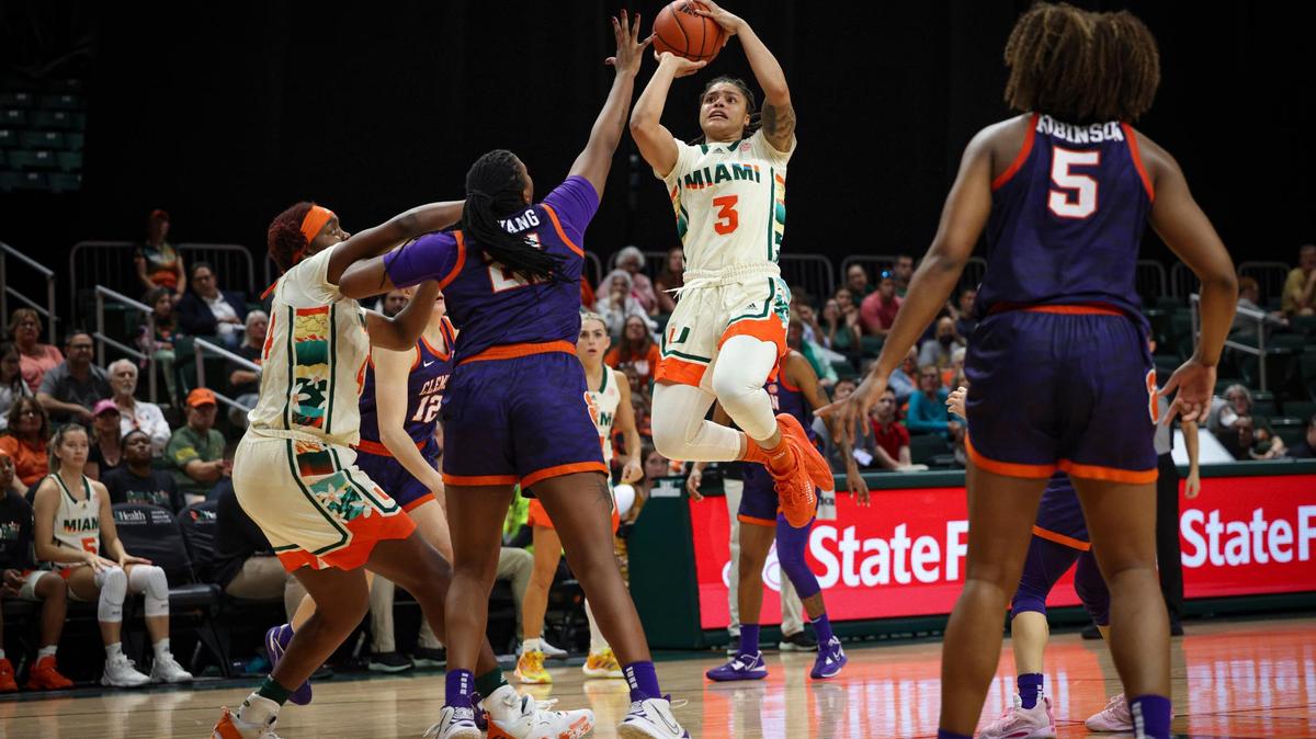 Hurricane’s Destiny Harden (3) shoots the ball over Clemson’s Eno Inyang (21) during the fourth quarter of an NCAA women’s basketball game between the Miami Hurricanes and the Clemson Tigers on Thursday, Feb. 16, 2023, at the Wastco Center in Coral Gables. The Hurricanes won 59-54.