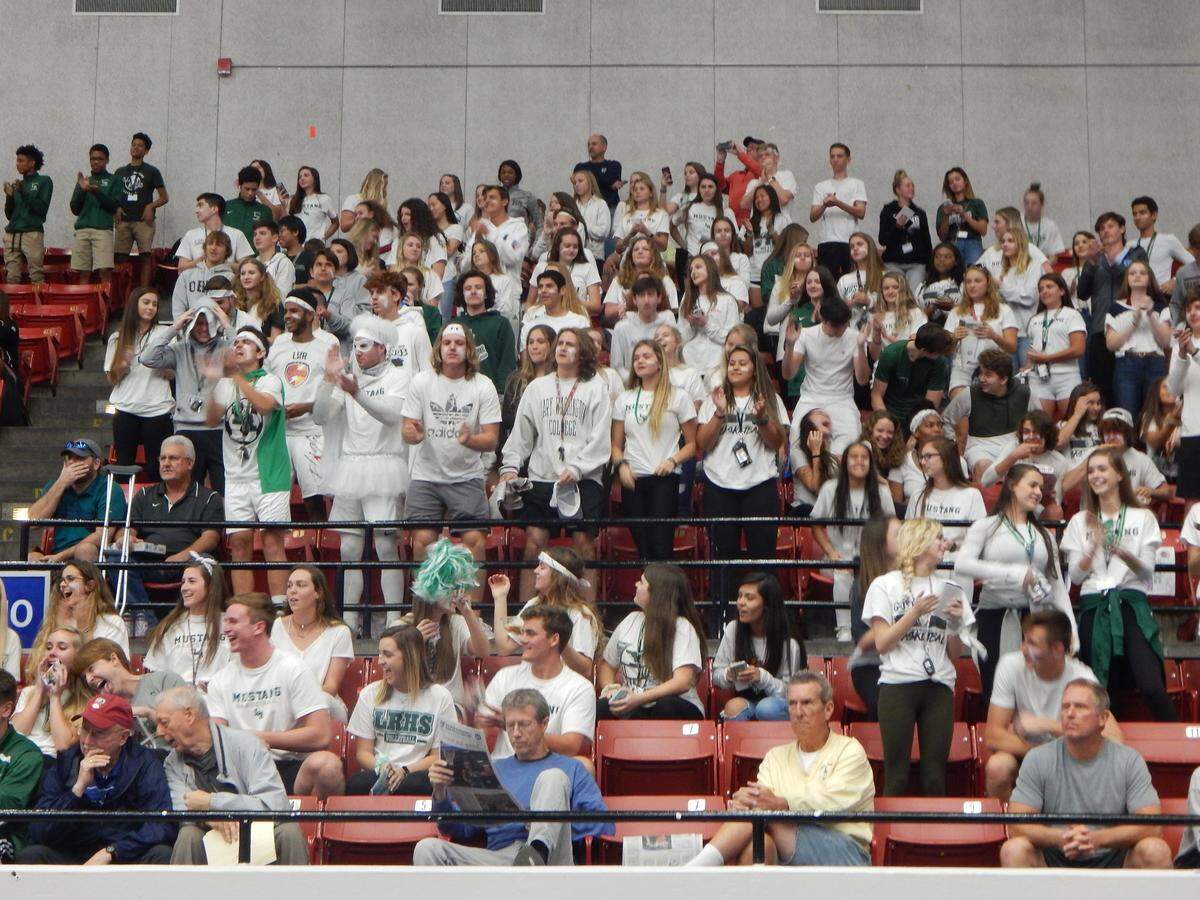 Lakewood Ranch boys basketball fans cheer on the Mustangs during Friday’s Class 8A state semifinal against Fleming Island at Lakeland’s RP Funding Center on March 8, 2019.