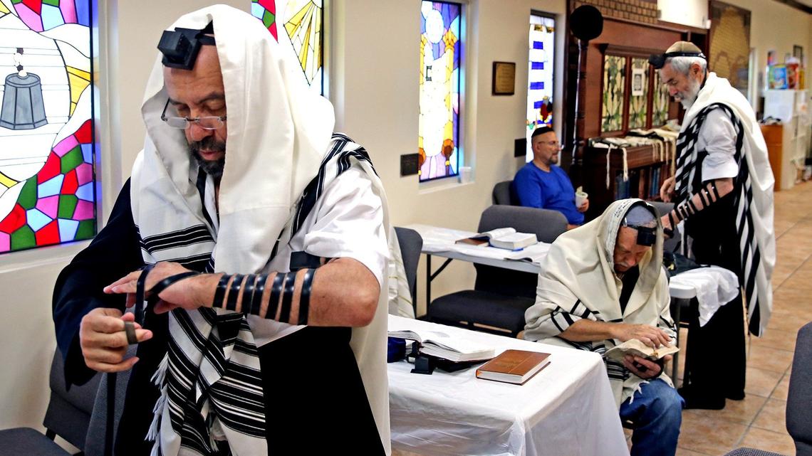 Ilya Spivak prepares for the prayer service at Chabad South Broward, a synagogue on Hallandale Beach’s mainland. Chabad South Broward is still encompassed by one of the city’s eruvs.