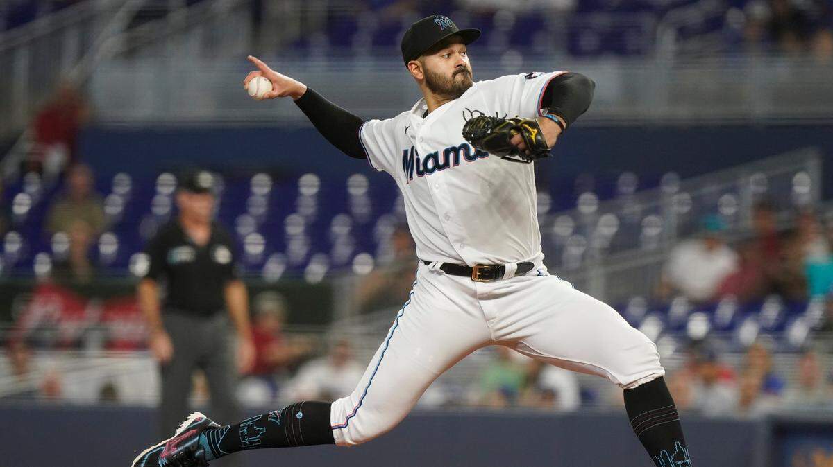 Miami Marlins starting pitcher Pablo Lopez aims a pitch during the first inning of a baseball game against the Los Angeles Dodgers, Monday, Aug. 29, 2022, in Miami. (AP Photo/Marta Lavandier)