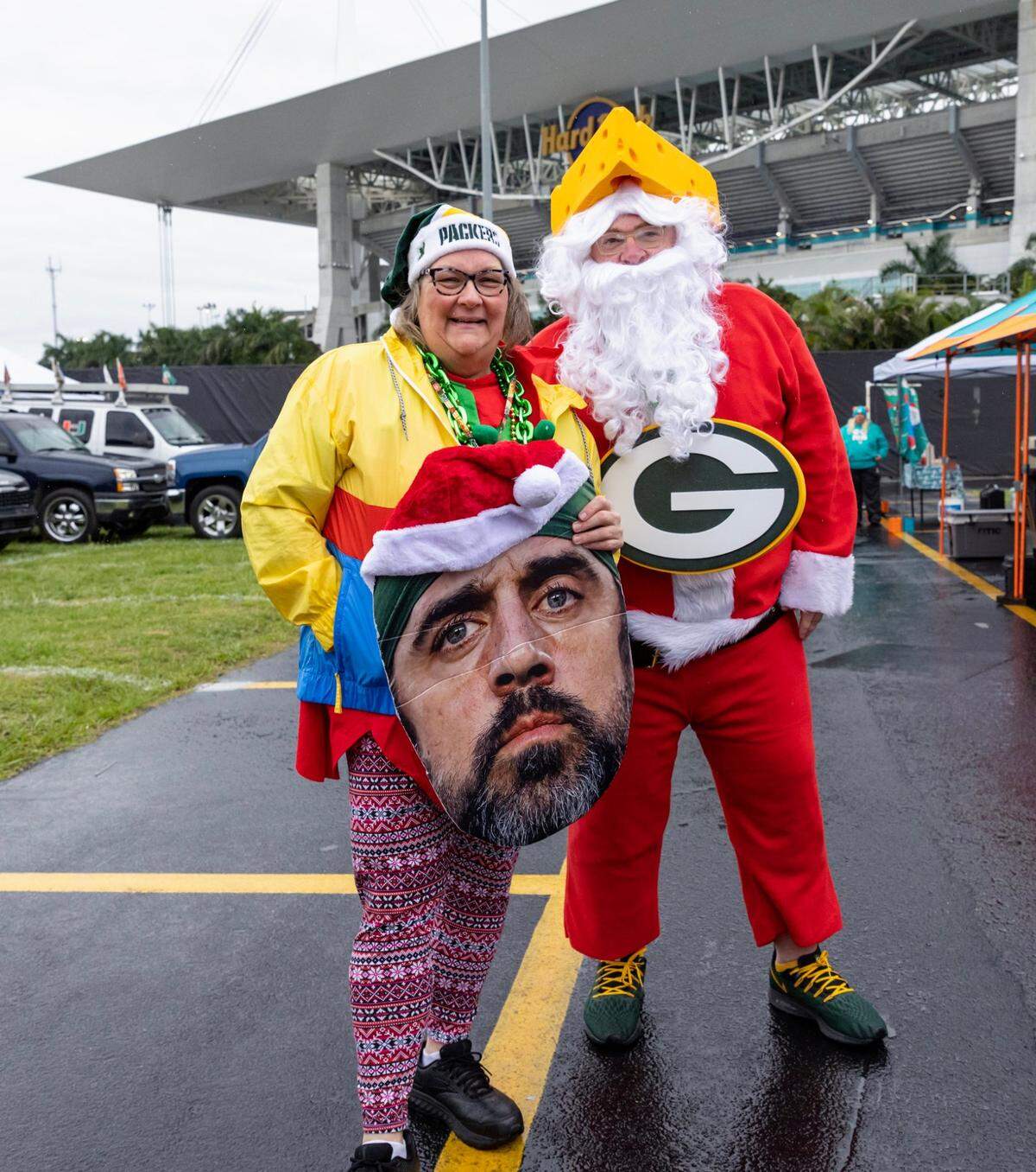 Green Bay Packers fans Trent and Sue Kramer tailgate before the start of an NFL game between the Miami Dolphins and the Packers Hard Rock Stadium in Miami Gardens, Florida on Sunday, December 25, 2022.